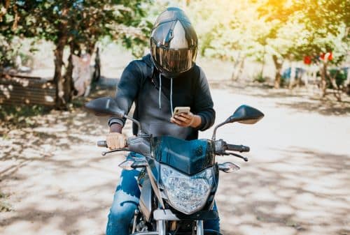 Motorcycle Driver on Cell Phone